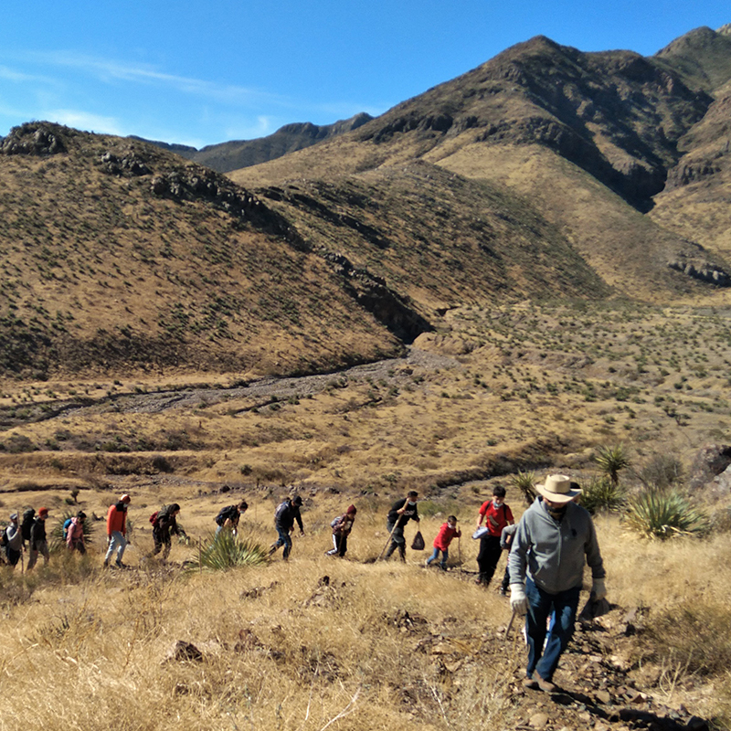 Group of people hiking in Castner Range.