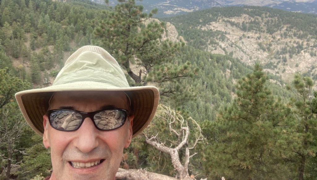 CO volunteer Jeremy selfie in the Colorado wilderness