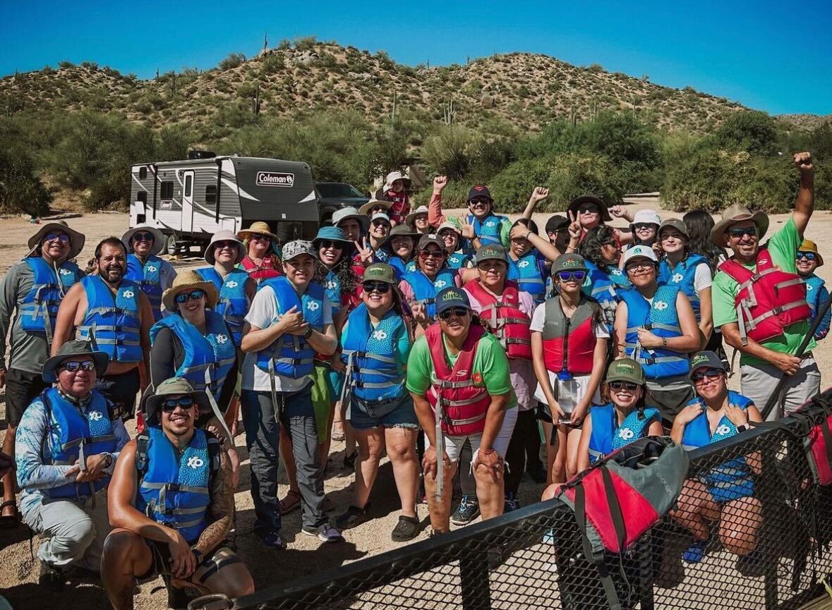 A group photo of participants in Chispa AZ's Latino Conservation Week kayaking event