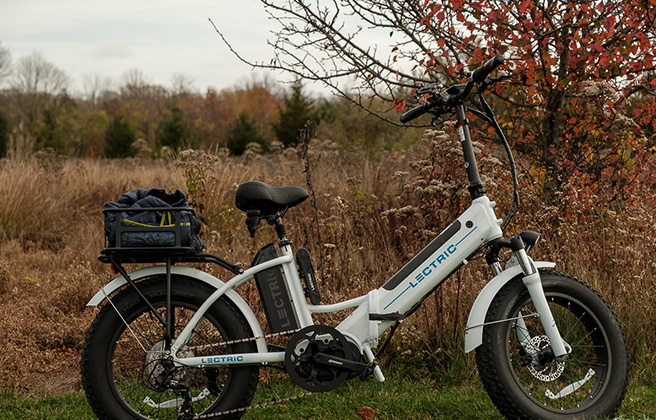 Closeup of an electric bike in a Fall landscape.