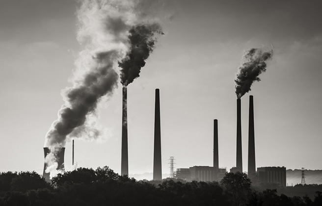 A group of smokestack emitting pollution.