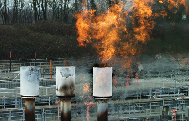 Methane flare creating fire and pollution.