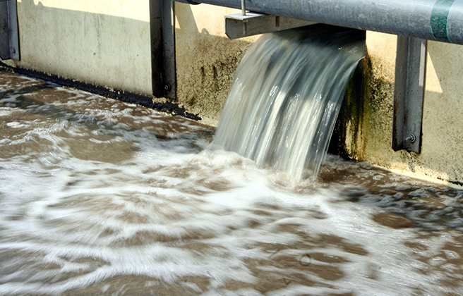 Water flowing at a waste water treatment facility.