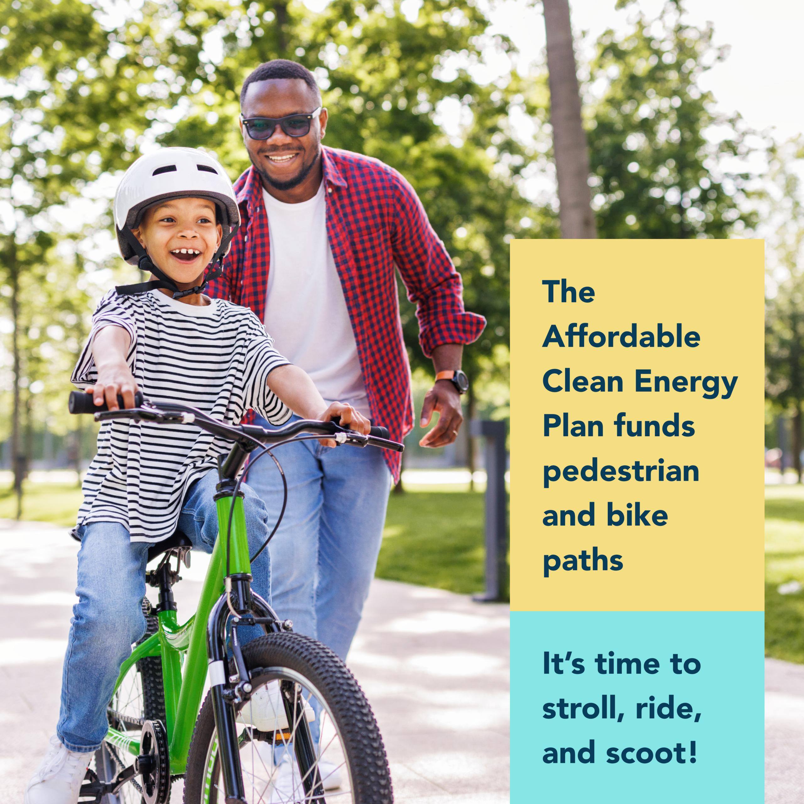 Excited young boy gets pushed on bike by father with text on right stating Clean Energy Plan funds walking and bike paths 