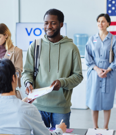 Voters check in to vote at polling station