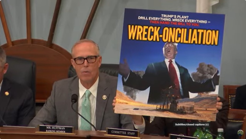 Rep. Jared Huffman with a photo of Trump and the words "Wreck-onciliation"