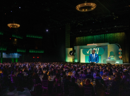 U.S. Senator Raphael Warnock addresses the room of attendees of the LCV Capital Dinner