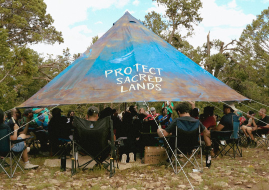 Community members gathered at an event at the Grand Canyon