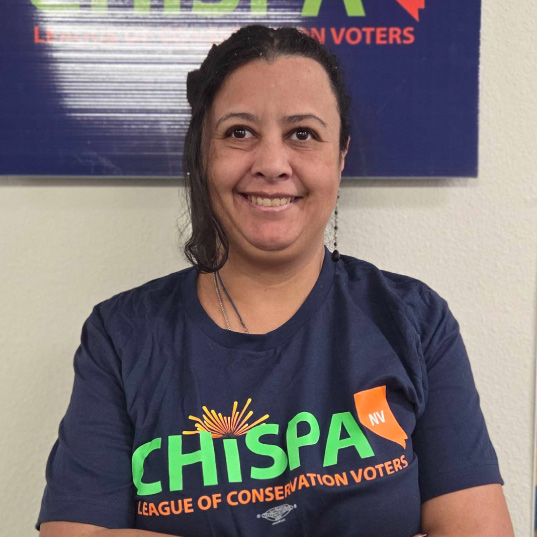 Yanci Hill smiles in a Chispa Nevada shirt